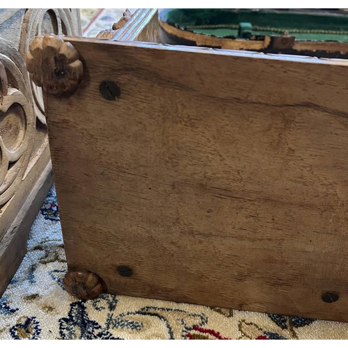 2010 - LATE 19TH OR EARLY 20TH CENTURY WALNUT BOOK SLIDE WITH CARVED ENDS, ENDS CARVED WITH FOLIAGE & CROSS... 