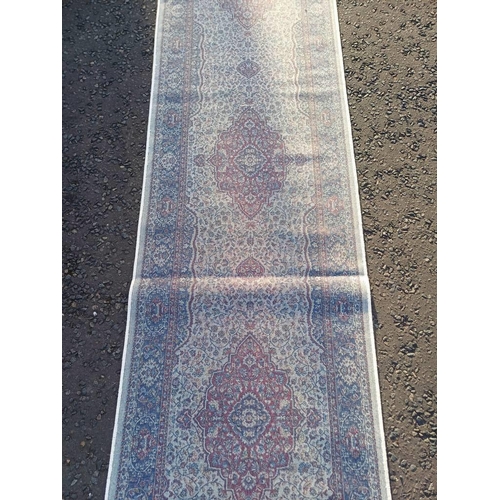 2063 - LARGE IVORY GROUND CASHMERE RUNNER WITH FULL PILE AND A TRADITIONAL MEDALLION DESIGN 502CM X 77CM