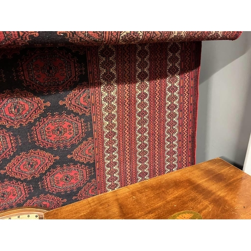 2091 - RED AND BLACK GROUND TURKMAN CARPET WITH ALL OVER DIAMOND BAKHAR DESIGN 390 X 253CM