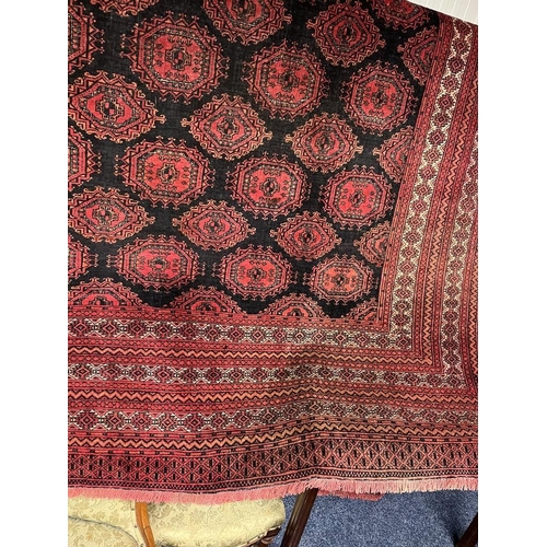 2091 - RED AND BLACK GROUND TURKMAN CARPET WITH ALL OVER DIAMOND BAKHAR DESIGN 390 X 253CM