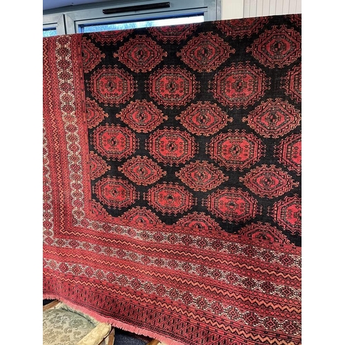 2091 - RED AND BLACK GROUND TURKMAN CARPET WITH ALL OVER DIAMOND BAKHAR DESIGN 390 X 253CM