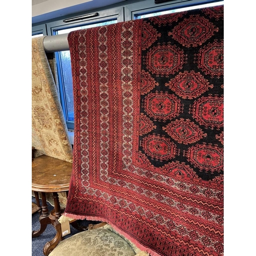 2091 - RED AND BLACK GROUND TURKMAN CARPET WITH ALL OVER DIAMOND BAKHAR DESIGN 390 X 253CM