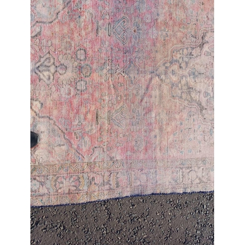 2112 - RED GROUND PERSIAN RUG WITH ALL OVER DESIGN 286 X 149CM
