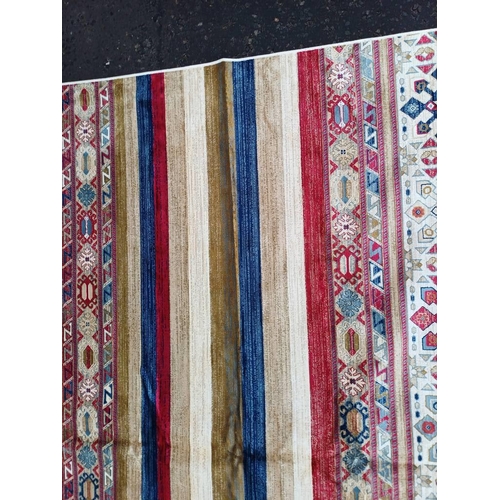 2139 - LARGE FULL PILE CASHMERE CARPET WITH MULTICOLOURED AZTEC DESIGN 383CM X 272CM