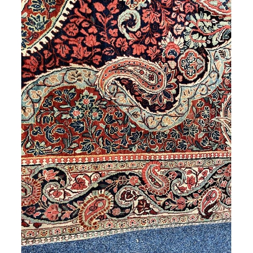 2312 - RED, PINK & GREEN FLORAL DECORATED RUG WITH BORDER DESIGN, 218 X 123 CM