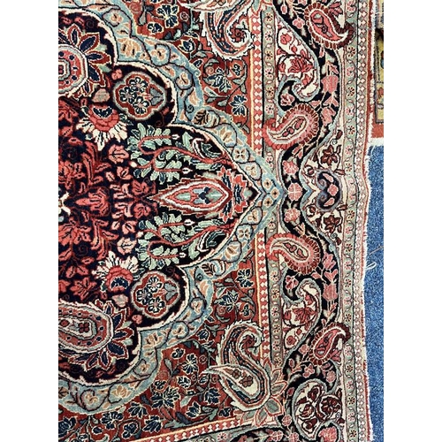 2312 - RED, PINK & GREEN FLORAL DECORATED RUG WITH BORDER DESIGN, 218 X 123 CM