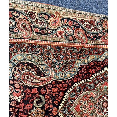 2312 - RED, PINK & GREEN FLORAL DECORATED RUG WITH BORDER DESIGN, 218 X 123 CM