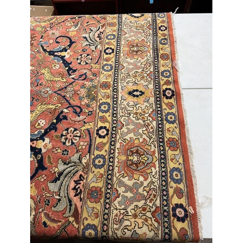 2321 - LARGE PINK & YELLOW GROUND MIDDLE EASTERN CARPET WITH ANIMAL, BIRD & FLORAL DESIGN, 390 X 300 CM