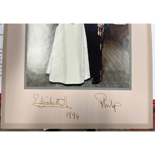 2330 - FRAMED PHOTOGRAPH OF PRINCE PHILIP AND QUEEN ELIZABETH II, SIGNED AND DATED 1994 TO THE MOUNT, IN SM... 