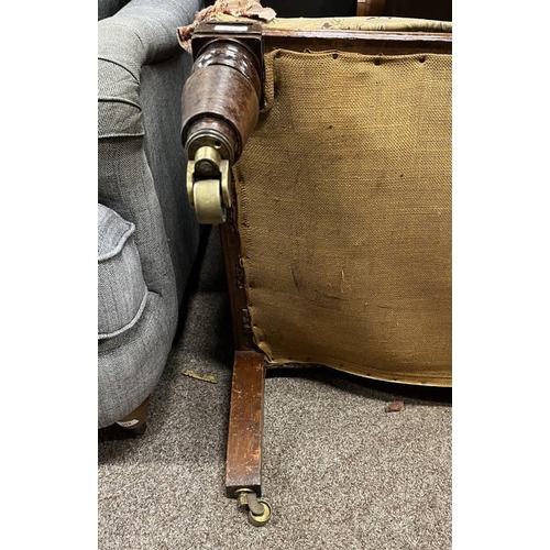 277 - 19TH CENTURY MAHOGANY FRAMED OVERSTUFFED 3 SEATER SETTEE WITH BRASS STUD WORK ON TURNED SUPPORTS