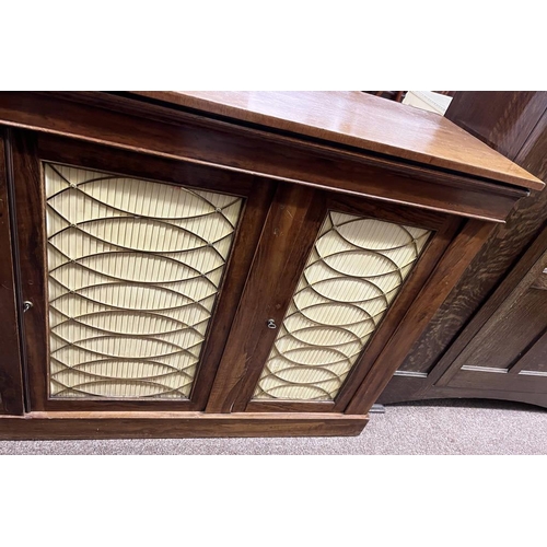 58 - LATE 19TH CENTURY WALNUT SIDEBOARD WITH 4 PANEL DOORS WITH DECORATIVE BRASS WORK ON PLINTH BASE.  93... 