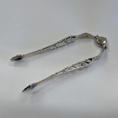 245 - PAIR OF GEORGE III SILVER PIVOT HINGE SUGAR TONGS WITH ACORN BOWLS BY JAMES PERRY CIRCA 1770