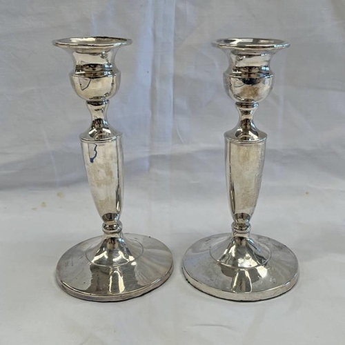 314 - PAIR OF SILVER CIRCULAR CANDLESTICKS, MARKS RUBBED - 17CM TALL