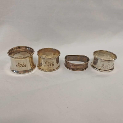 328 - 4 VARIOUS SILVER NAPKIN RINGS - 65G