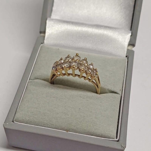 337 - 14K GOLD DIAMOND SET RING, THE GRADUATED DIAMONDS VERY APPROX. 0.8 CARATS - RING SIZE Q, 2.9G