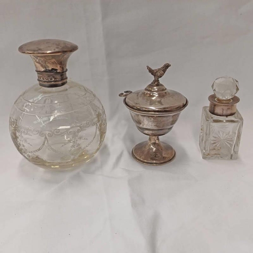 338 - 2 SILVER TOPPED CUT GLASS SCENT BOTTLES, BIRMINGHAM 1912 & 1946 AND LIDDED POT MARKED 925