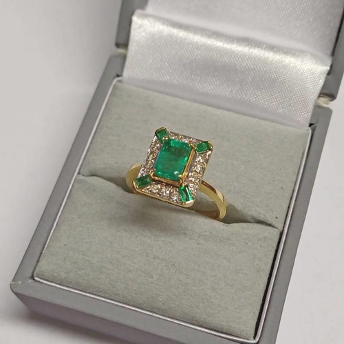 356 - 14CT GOLD EMERALD & DIAMOND CLUSTER RING, THE STEP CUT EMERALD SET WITHIN A SURROUND OF BRILLIANT CU... 