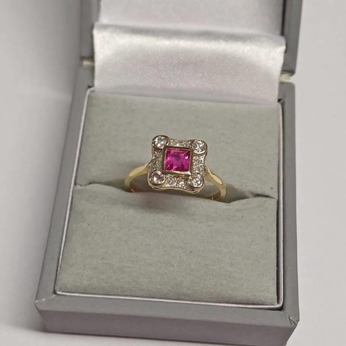 415 - 18CT GOLD & PLATINUM RUBY & DIAMOND RING, THE SQUARE CUT RUB SET WITHIN A SURROUND OF BRILLIANT CUT ... 