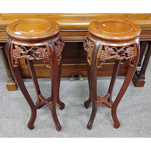 5427 - PAIR OF ORIENTAL HARDWOOD PLANT STANDS WITH CARVED DECORATION