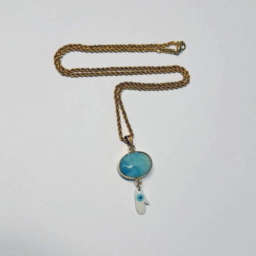 577 - 18K GOLD LARIMAR SET PENDANT ON AN 18CT GOLD CHOPARD ROPE TWIST CHAIN NECKLACE - CHAIN 11.2G