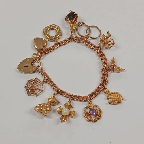 578 - 9CT GOLD CHARM BRACELET WITH 9CT GOLD CHARMS.  WEIGHT 31 GRAMS