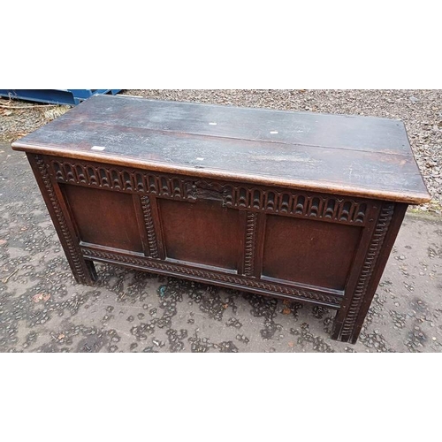 355 - 18TH/19TH CENTURY OAK COFFER WITH CARVED PANEL FRONT.  121 CM LONG