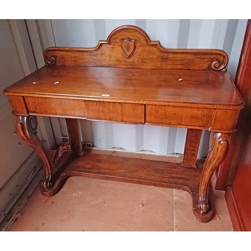 368 - 19TH CENTURY OAK SIDE TABLE WITH SHIELD BACK ON SHAPED SUPPORTS.  120 CM WIDE