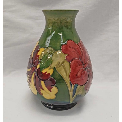 3017 - MOORCROFT GREEN BALUSTER HIBISCUS VASE, INITIALLED TO BASE - 21 CM TALL