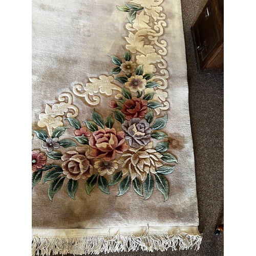 1512 - LARGE ORIENTAL FLORAL DECORATED CARPET WITH FRILLED ENDS, 380 X 360CM