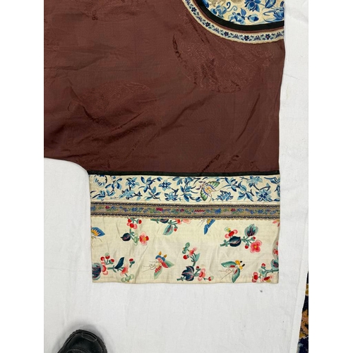 3003 - CHINESE BROWN ROBE WITH EMBROIDERED CIRCULAR PANELS OF DRAGONS WITH FLORAL DECORATED SILK HEMS - 119... 