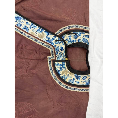 3003 - CHINESE BROWN ROBE WITH EMBROIDERED CIRCULAR PANELS OF DRAGONS WITH FLORAL DECORATED SILK HEMS - 119... 