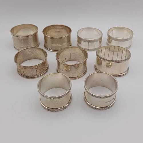 115 - 9 SILVER NAPKIN RINGS FROM VARIOUS MAKERS & DATES, 170G