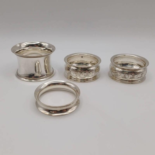 203 - 4 SILVER NAPKIN RINGS TO INCLUDE AN ANGRAVED PAIR, BIRMINGHAM 1909 & 2 OTHERS