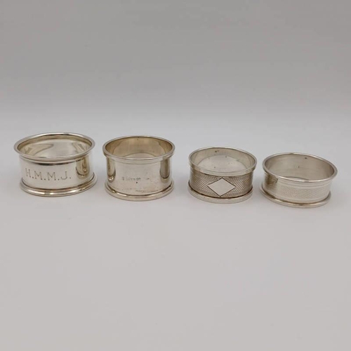 254 - 4 SILVER NAPKIN RINGS, BIRMINGHAM 1931, BIRMINGHAM 1936, SHEFFIELD 1944 & 1 MARK RUBBED, 67G