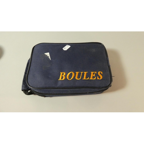 57 - A Set of French Boules In Canvas Bag