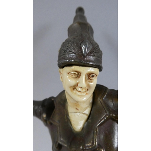 106 - A Mid 20th Century Art Deco Style Bronzed Metal Figure of a Jester with an Ivorine Face and Painted ... 