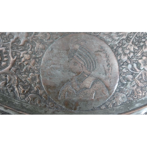 107 - A 19th Century Indian Tinned Copper Charger commemorating the Greek Invasion of India in 326BC. Embo... 