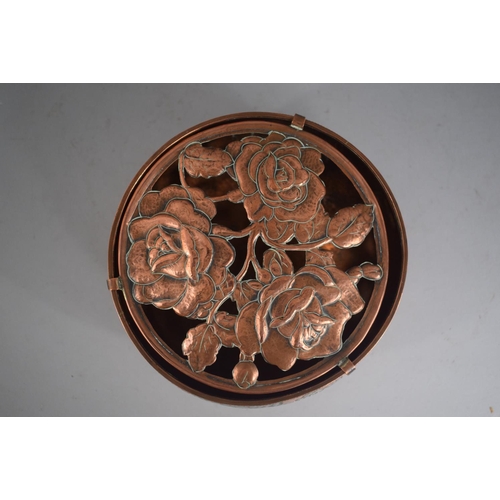 112 - A Harold Holmes Arts and Crafts Copper and Pewter Potpourri. Pierced Lid with Three Stylised Roses, ... 