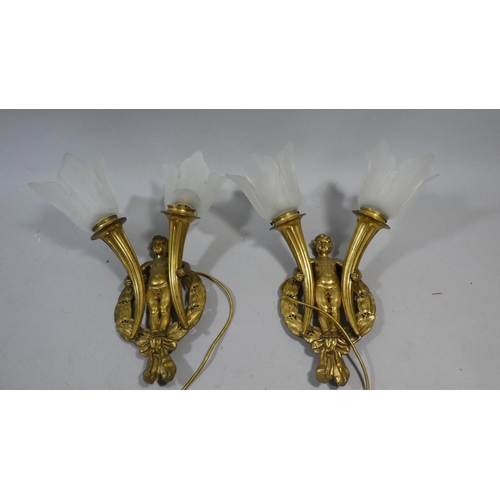 115 - A Pair of Good Quality Gilt Bronze Two Branch Figural Wall Lights with Opaque Glass Shades. The Moun... 