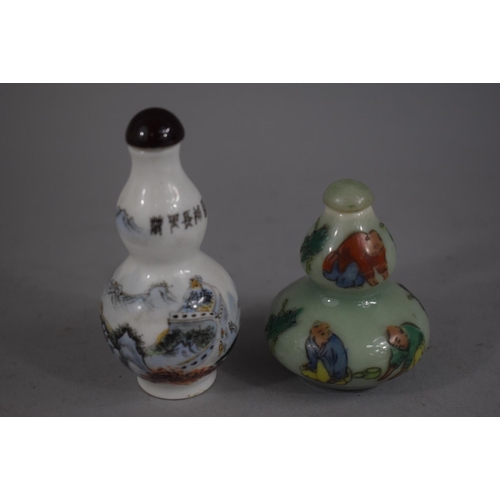 216 - A Chinese Celadon Double Gourd Snuff Bottle decorated with Applied Enamels depicting Farmers Toiling... 