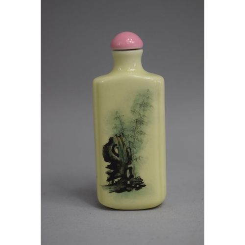 223 - A Chinese Porcelain Yellow Glazed Snuff Bottle of Rectangular Form decorated with Handpainted Cockat... 