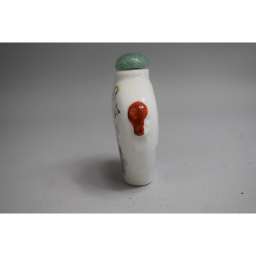 225 - A Chinese Ceramic Snuff bottle of Oval Form with Rounded Shoulders, Tapering to Base with Handpainte... 