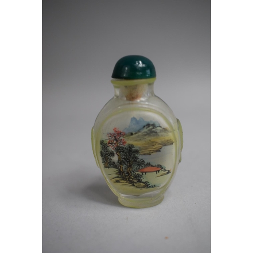 226 - A Collection of Three Chinese Reverse Painted Snuff Bottles, One of Rectangular Form decorated with ... 