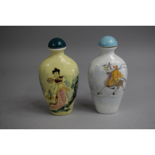 228 - A Chinese Ceramic Snuff Bottle of Spade Form with Rounded Sloping Shoulders decorated with Enamels d... 