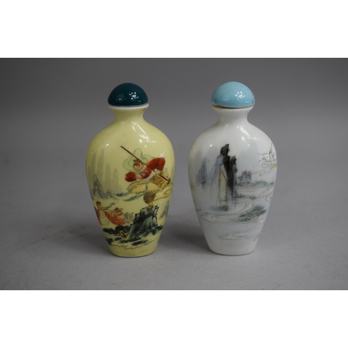 228 - A Chinese Ceramic Snuff Bottle of Spade Form with Rounded Sloping Shoulders decorated with Enamels d... 