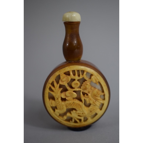 235 - An Oriental Horn Snuff Bottle of Circular Form with Elongated Turned Wooden Cylindrical Neck having ... 