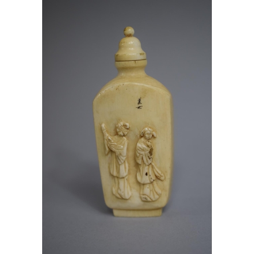 236 - A Chinese Ivory Snuff Bottle of Rectangular Form with Rounded Sloping Shoulders set on Raised Foot w... 