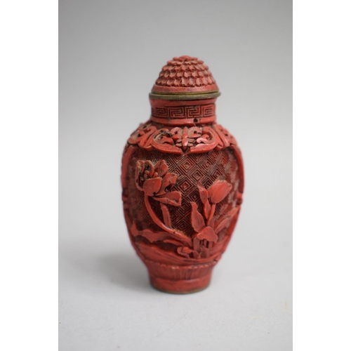 237 - A Chinese Composite 'Cinnabar Lacquer' Snuff Bottle with Carved Decoration depicting Bird Among Foli... 