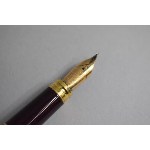 245 - A Waterman Red Lacquer Cartridge Pen with 9 Carat Gold Mounts and 18k Nib. Complete with 7 Boxes of ... 