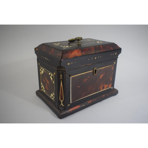 27 - A Mother of Pearl Inlaid Tortoiseshell Tea Caddy of Sarcophagus Form with Canted Sides. 18x12x14cms